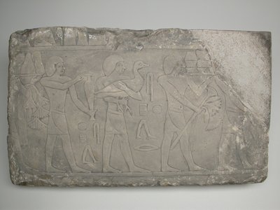 Haudan seinän katkelma, joka kuvaa uhrin kantajia. tekijältä Ancient Egyptian