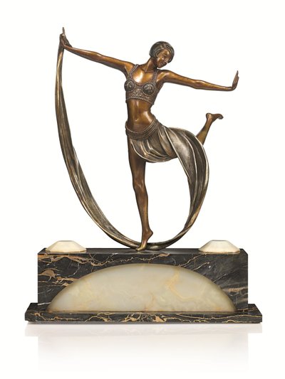 Art Deco -hahmo valaistulla pohjalla, "Espirit de Josephine Baker", n. 1925 (patinoitu ja kylmämaalattu pronssi) tekijältä Claire Jeanne Roberte Colinet