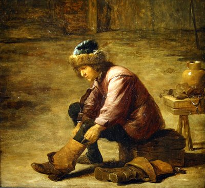 Nuori mies vetää kenkiä tekijältä David Teniers the Younger