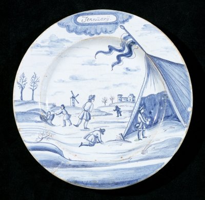Delftware-lautanen, joka kuvaa tammikuuta (tinalasitettu keramiikka) tekijältä Dutch School