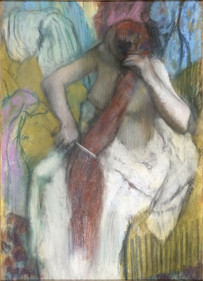 Nainen kampaa hiuksiaan tekijältä Edgar Degas