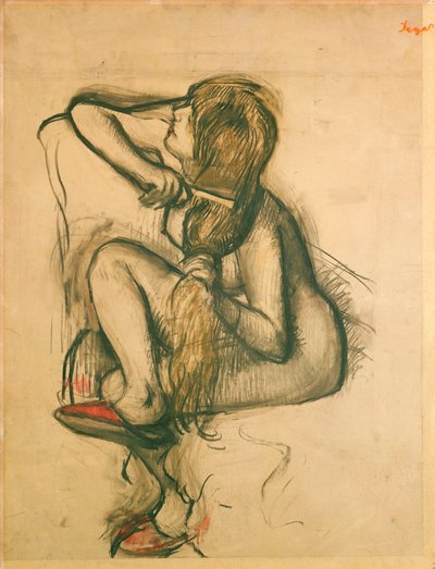 Nainen kampaa hiuksiaan tekijältä Edgar Degas