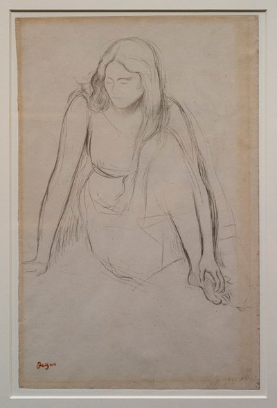 Nainen istuu veden äärellä. Noin 1867-1868. Musta lyijykynä veliinipaperilla. tekijältä Edgar Degas