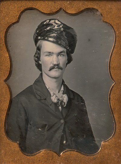 Viikset mies ja öljynahkahattu, 1854-55. tekijältä Edward M. Tyler