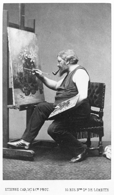 Gustave Courbet maalaamassa maalaustuolissaan (kuva) tekijältä Etienne Carjat
