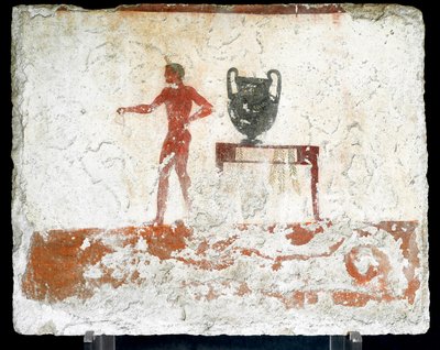 Etruskien taide: nuori alaston efebe lähellä pöytää, johon asetetaan maljakko. Fresko "sukeltajan" haudasta. Paestumin eteläiseltä hautausmaalta. 480-470 eaa. Museo Archeologico Nazionale, Paestum tekijältä Etruscan