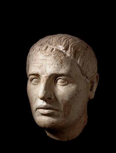 Miehen pää, vaaleaa savea, 2. vuosisadalla eKr tekijältä Etruscan