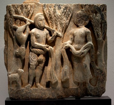 Vaihda vaatteita metsästäjän kanssa. Matala kohokuvio veistetty, Gandharan taide (Pakistan), 2.-3. vuosisadalla. Korean kansallismuseo, Soul (Etelä-Korea). tekijältä Gandhara School