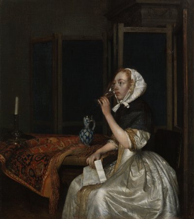 Nuori nainen, jolla on lasi viiniä ja joka pitää kirjettä kädessään tekijältä Gerard ter Borch
