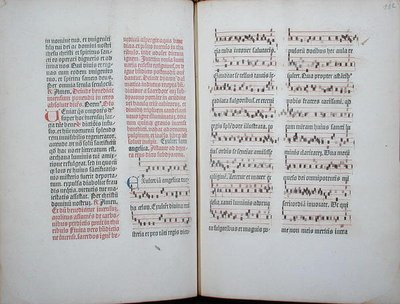 Kaksoissivu, jossa on yksittäinen laulu, joka on otettu inkunaabulista, Missale Romanumista, n. 1482 (vellum) tekijältä German School