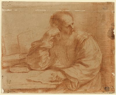 Parrakas mies istuu pöydän ääressä tekijältä Guercino