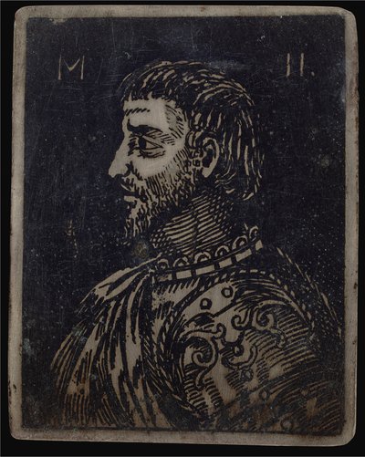 Partaisen miehen rintakuva, jossa koristeellinen rintalevy vasemmalle tekijältä Italian 16th Century