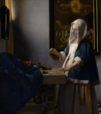 Frau mit Waage tekijältä Johannes Vermeer