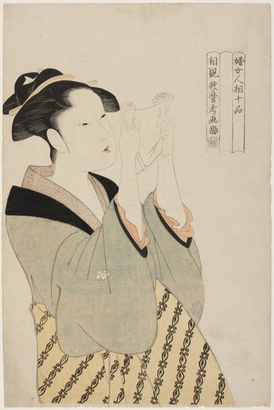 Nainen lukemassa kirjettä, sarjasta Naisten fysiognomian kymmenen luokkaa (Fujo ninso juppon) (Fumi yomu onna) (Fumi yomu onna) tekijältä Kitagawa Utamaro