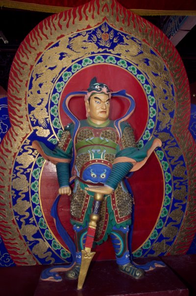 Soturin patsas Yingxianin (tai Sakyamuni-pagodin) puisen pagodin sisällä lähellä Datongia Kiinassa. Kiinan sivilisaatio tekijältä Unbekannt Unbekannt