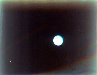 Uranus satelliittien Miranda, Ariel ja Umbriel kanssa, Voyager 2:sta, 24. tammikuuta 1986. tekijältä NASA Images