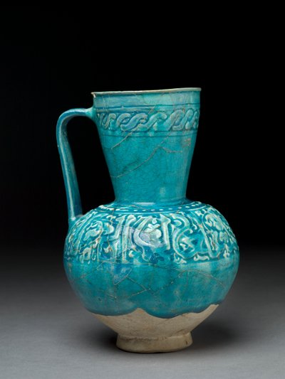 Muotoiltu kannu, Iran, 1100-luku (kivitahna turkoosilla lasiteella) tekijältä Persian School