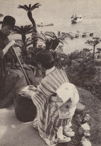 Japanilainen liikemies ja hänen sihteerinsä tekevät pikakirjoituksia (m/w kuva) tekijältä Photographer Japanese