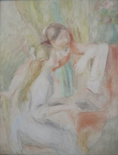 Nuoret tytöt pianon ääressä tekijältä Pierre Auguste Renoir