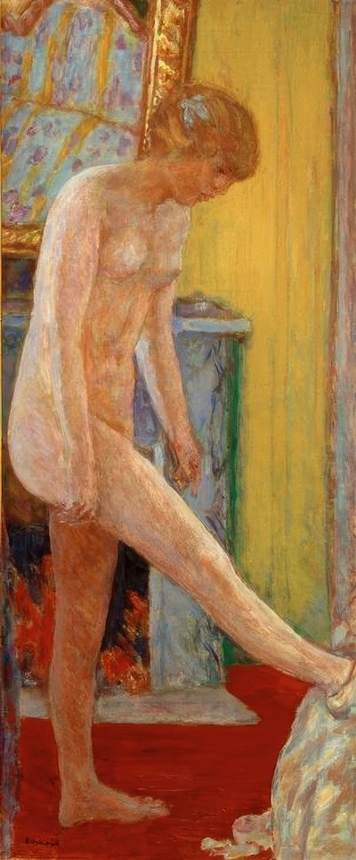 Alaston tyttö takan edessä tekijältä Pierre Bonnard