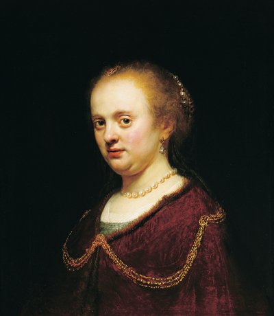 Nuori nainen kultaketjulla tekijältä Rembrandt Harmensz. van Rijn