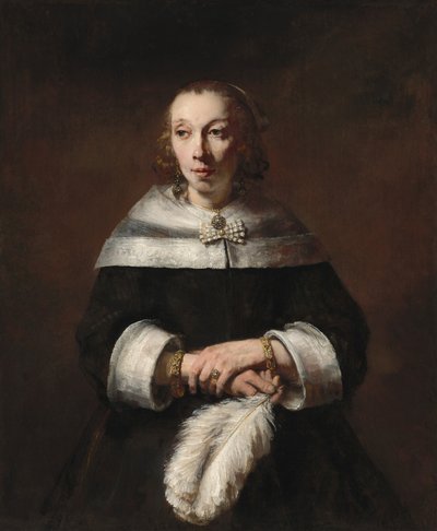 Naisen muotokuva strutsiviuhkan kanssa tekijältä Rembrandt van Rijn