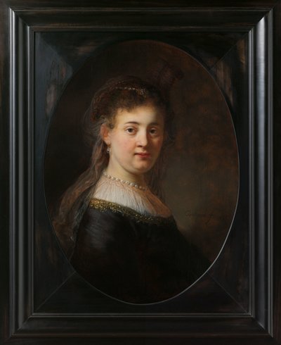 Nuori nainen fantasiaasussa tekijältä Rembrandt van Rijn
