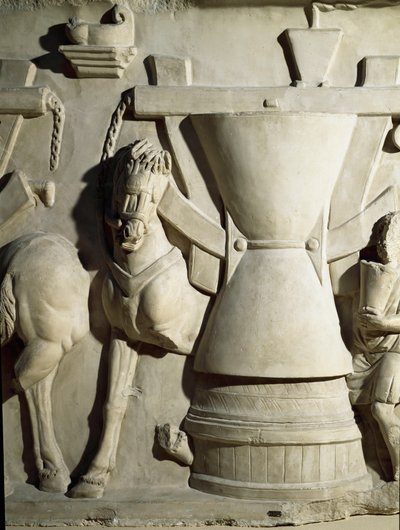 Roomalainen taide: matala kohokuvio, joka edustaa myllyn pyörää. 1. vuosisadalla jKr. Rooman Museo della Civilta Romana tekijältä Roman