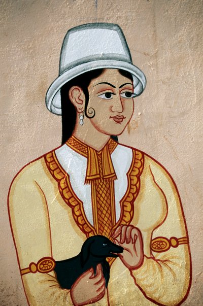 Seinämaalaus brittiläinen nainen ja pentu, Jaipur, Rajasthan, Intia tekijältä School Indian