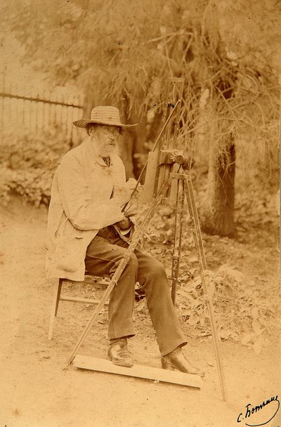 Runoilija Jakov Petrovitš Polonskin (Iakov Petrovitš Polonski) (1819-1898) muotokuva maalaustelineessä. Albumin Kuva: Sergei Dmitrievich Botkin (1869-1945) tekijältä Sergei Dmitrievich Botkin