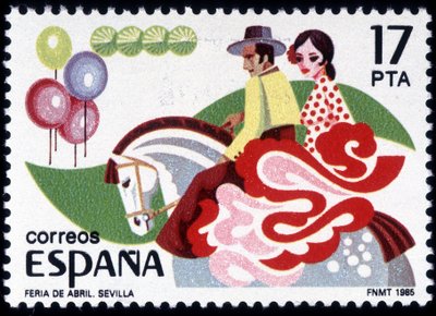 Sevillan Feria: pariskunta kansanpuvussa hevosen selässä - espanjalainen postimerkki tekijältä Spanish School