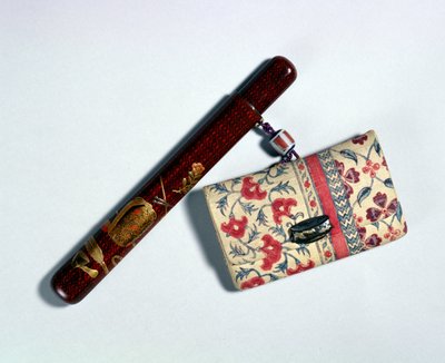Tupakkapussi ja piipputeline, japanilainen, 1800-luku tekijältä Taishin Ikeda