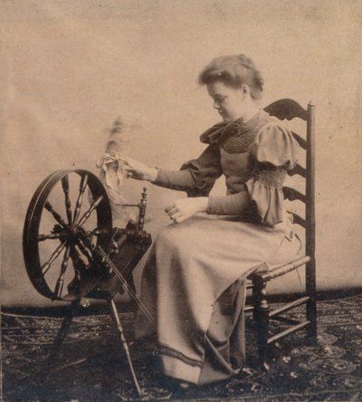 Nainen pyörän luona c1900 tekijältä Unbekannt