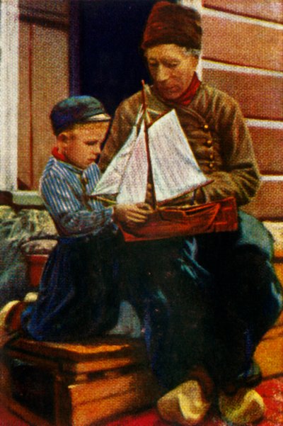 Hollantilainen isä ja poika perinteisessä asussa, vuodelta 1928. tekijältä Unbekannt