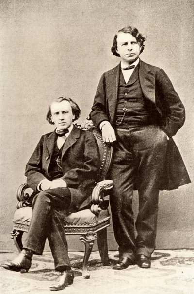 Johannes Brahms (1833-1897) saksalainen säveltäjä, istumassa Joseph Joachimin (1831-1907) unkarilaisen viulistin ja säveltäjän sekä Berliinin konservatorion johtajan kanssa. Puolitoisto valokuvasta (vedos) tekijältä Unknown photographer