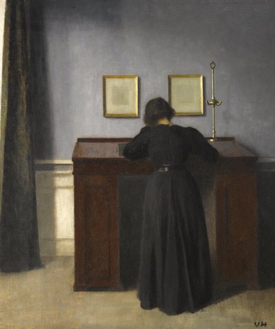Ida seisoo pöydän ääressä, 1900 tekijältä Vilhelm Hammershoi