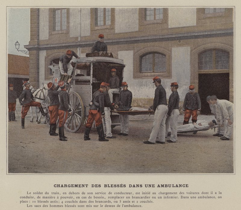 Haavoittuneen lastaus ambulanssiin (värillinen kuva) tekijältä (after) French Photographer