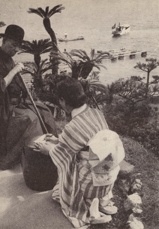 Japanilainen liikemies ja hänen sihteerinsä tekevät pikakirjoituksia (m/w kuva) tekijältä Photographer Japanese