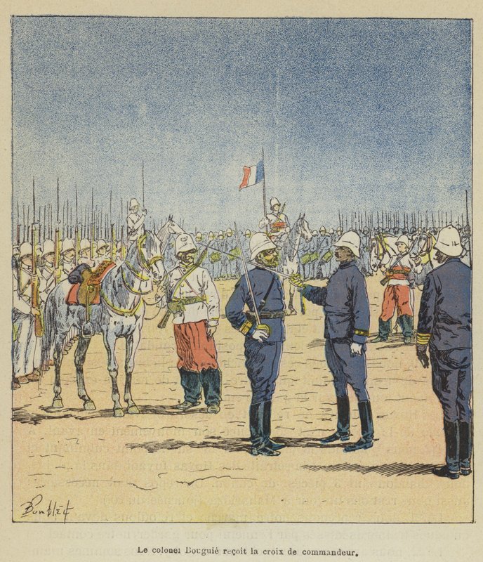 Eversti Bouguie saa komentajan ristin tekijältä after Louis Charles Bombled