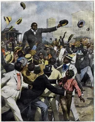 Nyrkkeilijä Jack Johnson saapui Chicagoon vuonna 1910. Achille Beltramen kuvitus elokuvaan La Domenica del Corriere”.