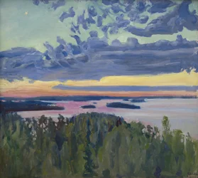 Auringonlasku järven yli.