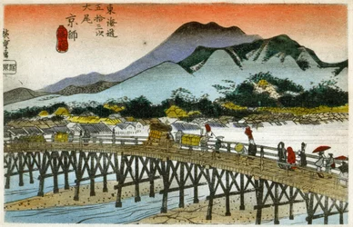 Maantiede. Aamun hehku Nihonbashilla (55. asema). Hiroshigen puupiirros teoksessa: Fifty Three Stations of the Tokaido (1833-1834). Postikortti, Japani, n. 1900 (postikortti)