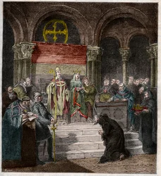Keisari Henrik IV (1050-1106) paavi Gregorius VII:n (1020-85) jalkojen juuressa.