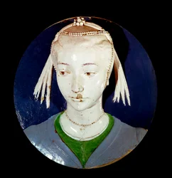 Nuoren muukalaisen Tondon muotokuva terrakottasisustuksessa Andrea della Robbia
