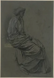 Istuva nainen