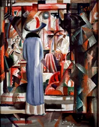 Suuri valaistu näyteikkuna. Pitkään takkiin ja hattuun pukeutunut nainen katselee näyteikkunaa. 1912, mitat 105 x 85 cm, Hannover, Sprengel Museum