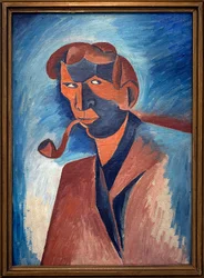 Tupakointi (omakuva). Bohumil Kubistan (1884-1918) maalaus, öljy kankaalle 1910. Tšekkiläinen taide 1900-luku. Veletrzni Palace (Messupalatsi), Praha (Tšekki).