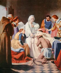 Kolumbus kuolinvuoteellaan pitelemässä kahleita, joissa hän palasi kolmannelta matkaltaan (väri litho)