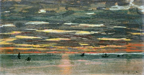 Auringonlasku meren yllä