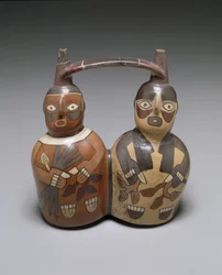 Kaksoissuihkuinen hihnakahva-astia: Nazca, AD 100-150 (keramiikka, jossa on liukastumaa).